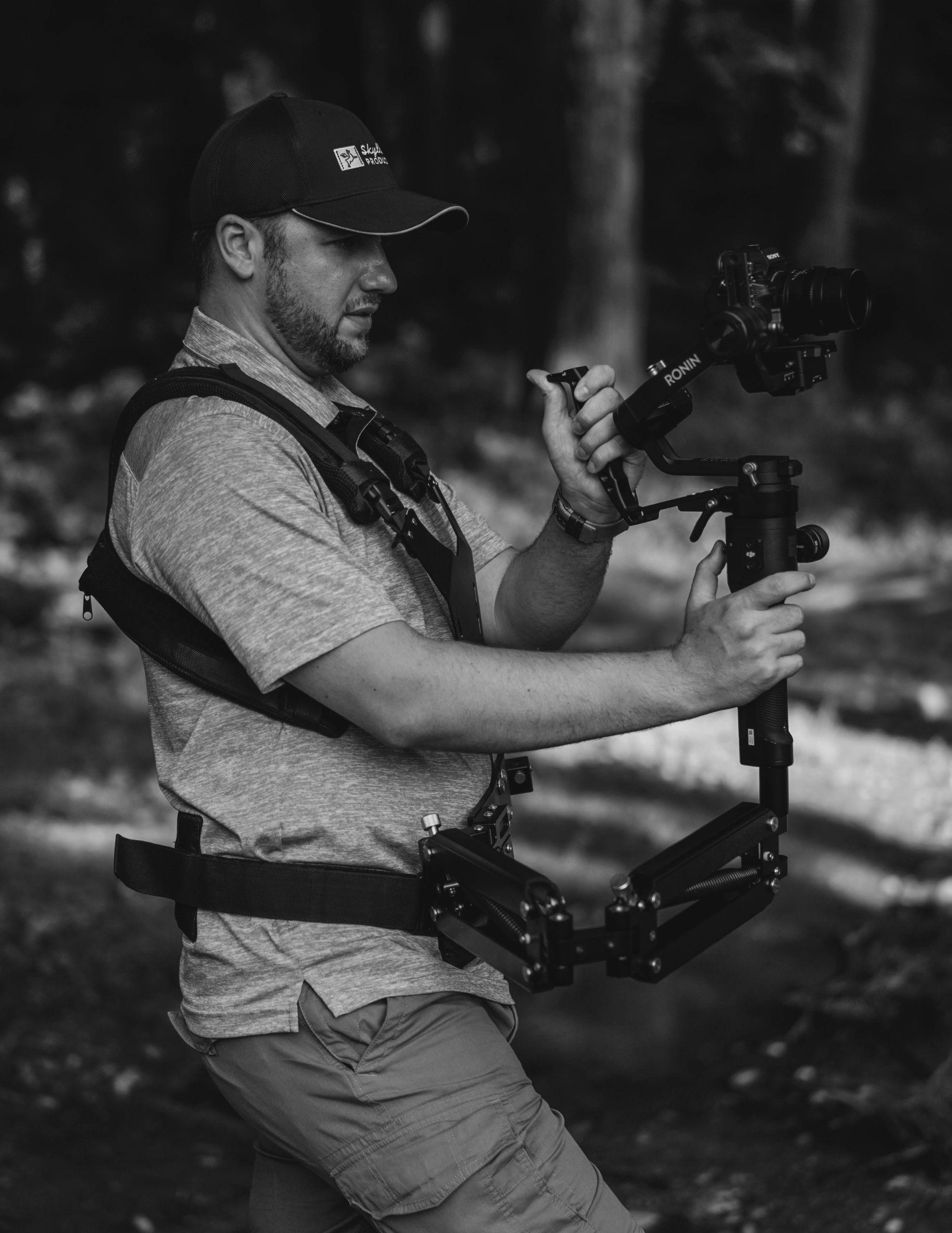 Slawomir Roszak operating a cinema camera on a stabilizer rig